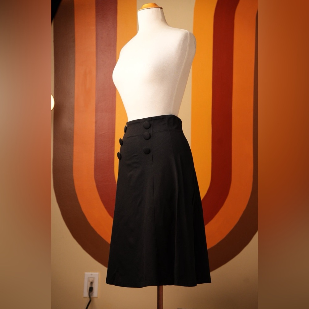Forties and fifties inspired fit and flare high waist a line black skirt